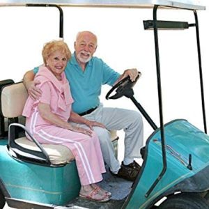Seniors In Golf Cart